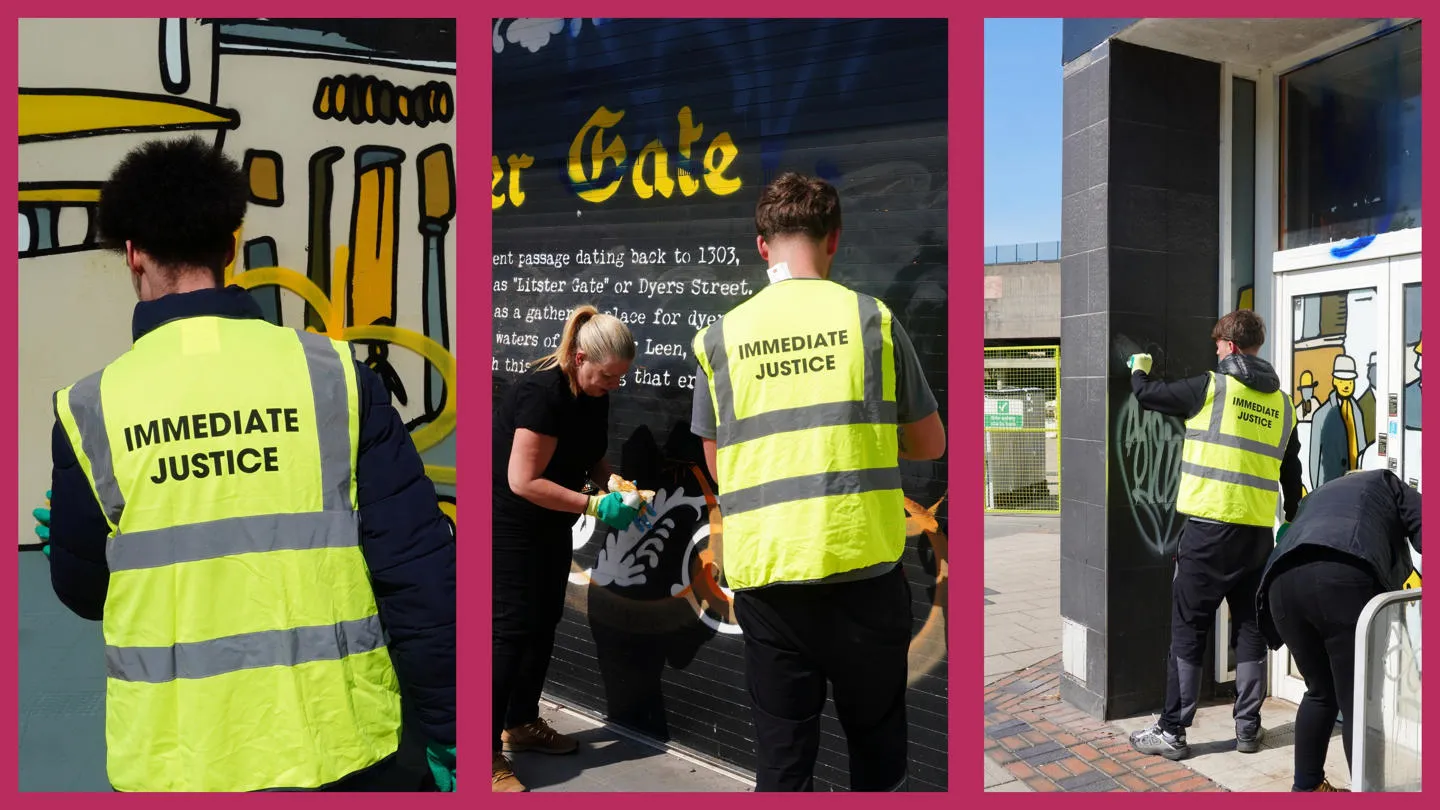 Immediate Justice service users cleaning off graffiti on Lister Gate
