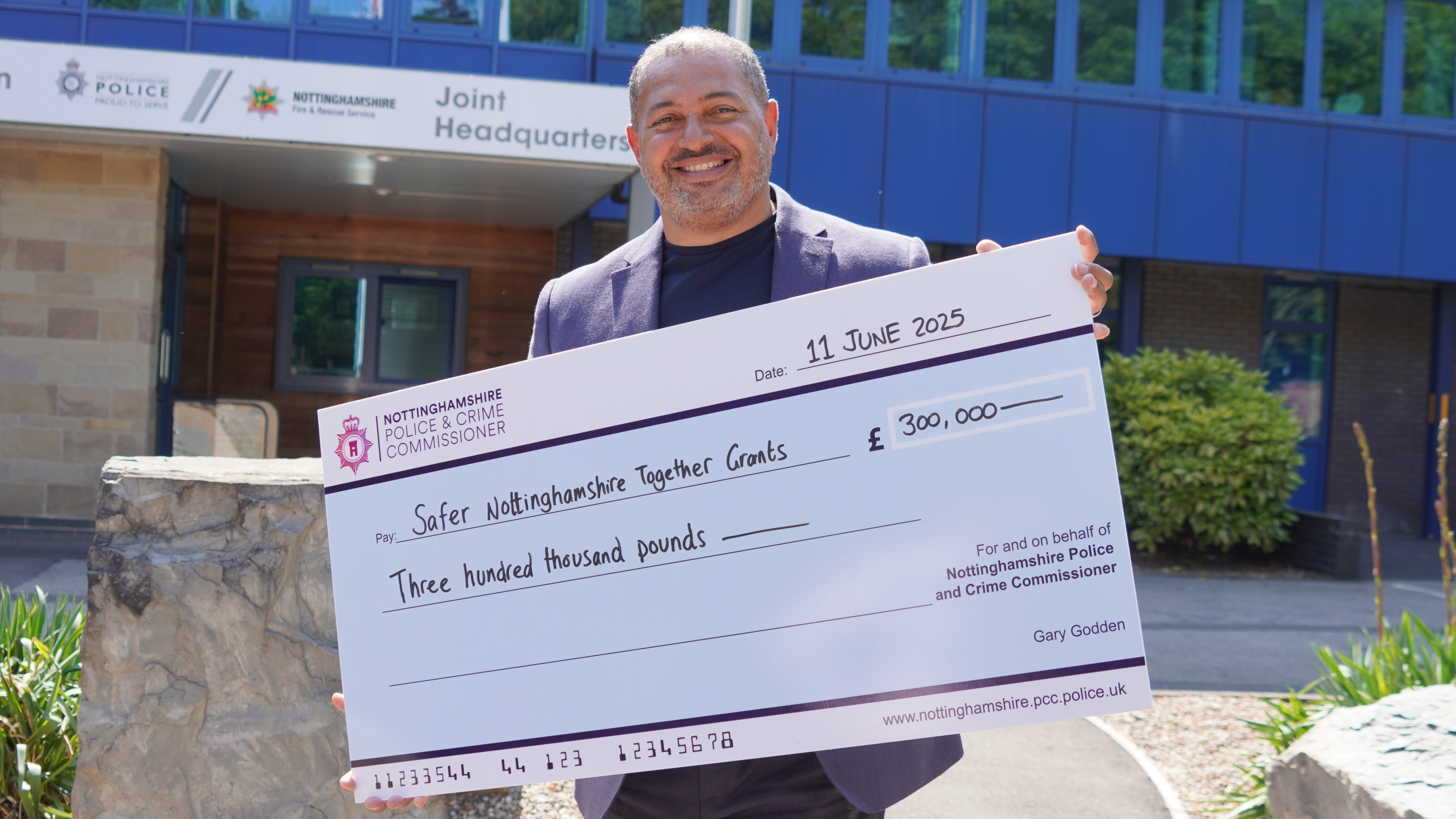 PCC Gary Godden with a cheque