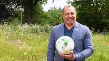 PCC Gary Godden holding a football