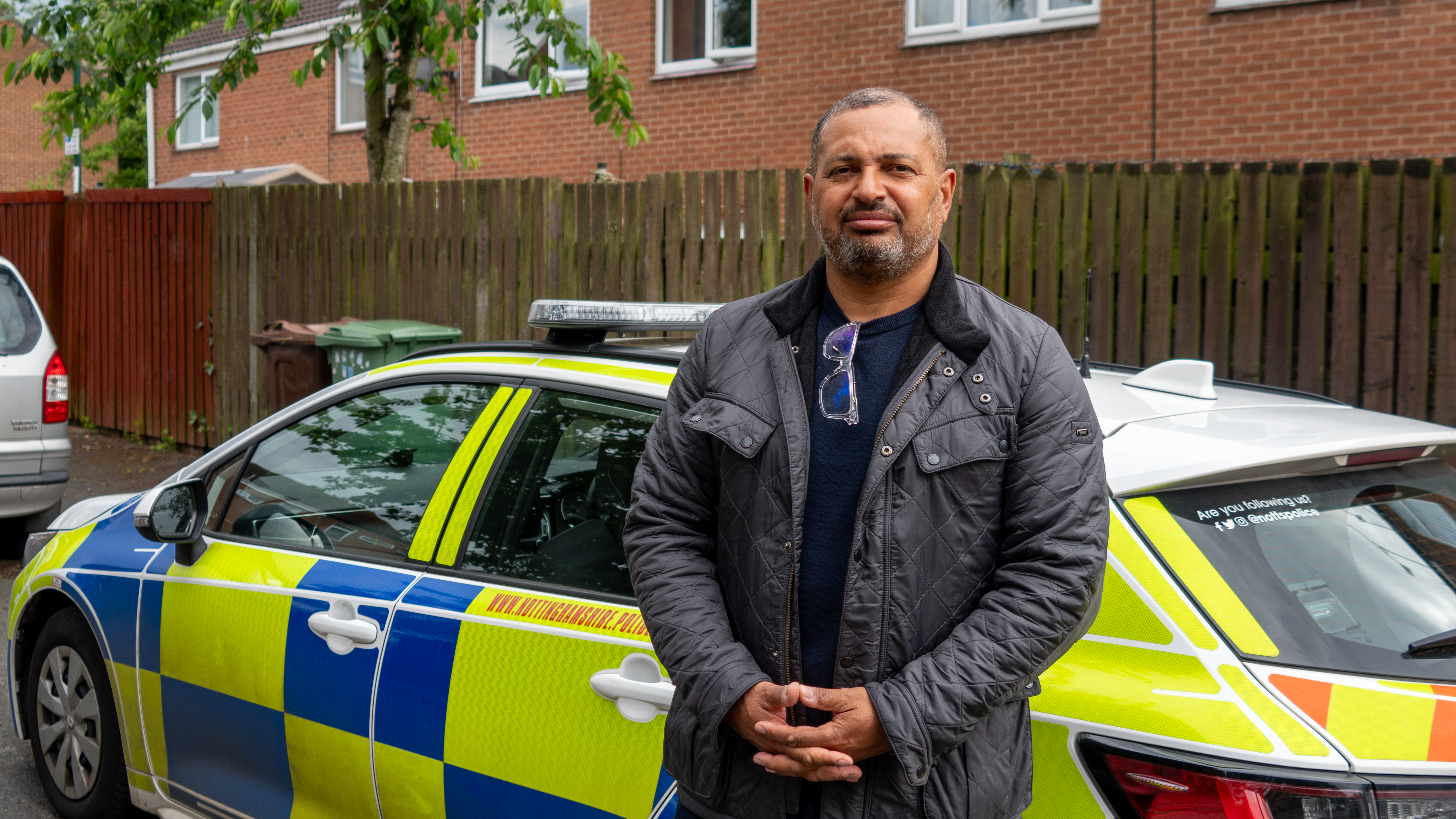 PCC in front of police car