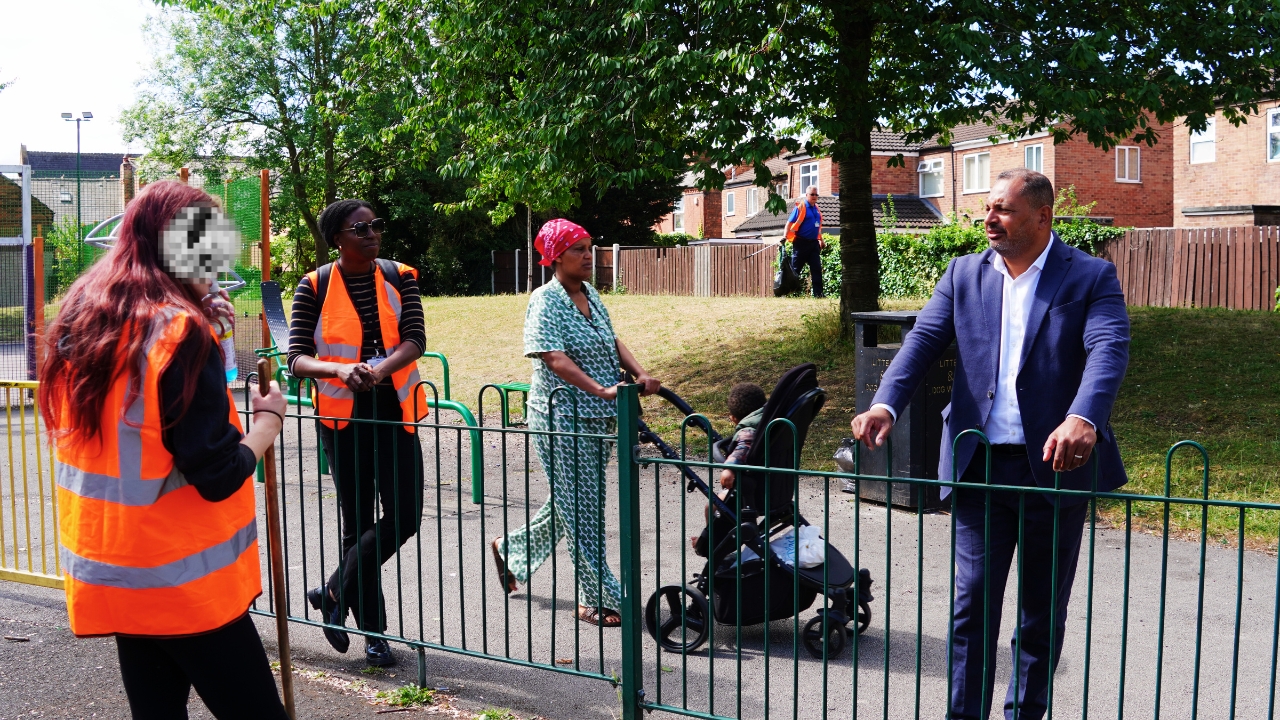 PCC Godden speaking with an IJ service user during the day of action