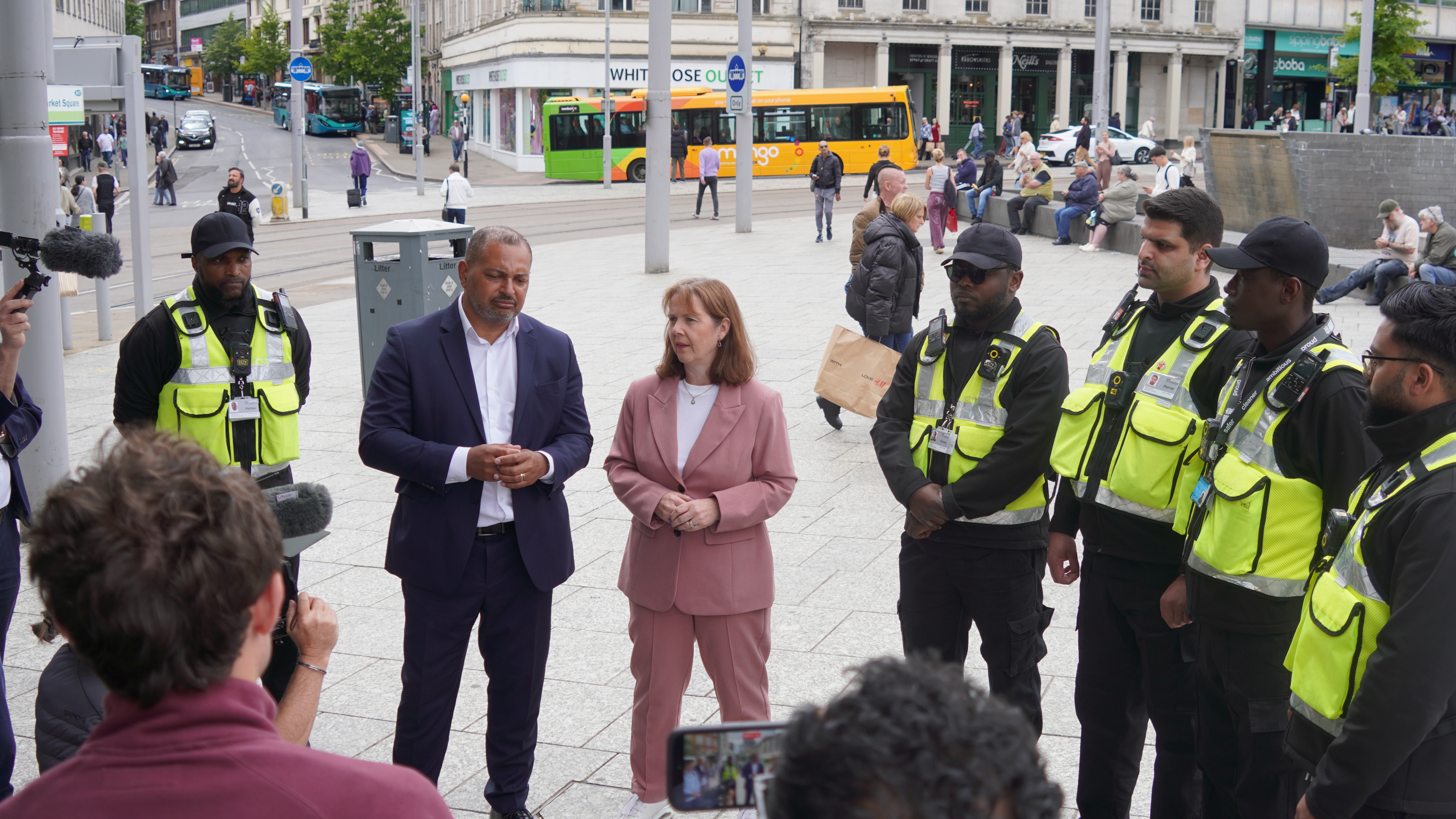 PCC Gary Godden and Mayor Claire Ward with some of the Operation SafeTravel officers