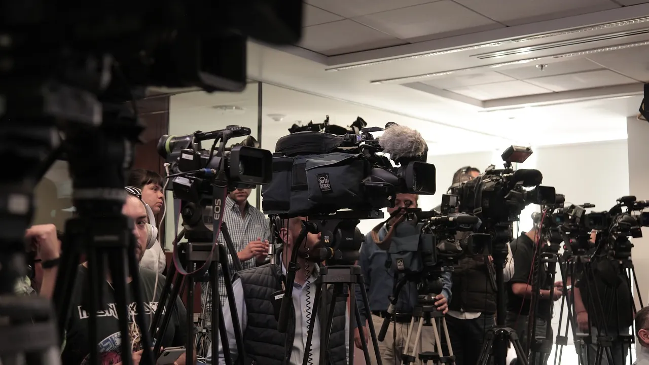 Generic image of the media - a row of camera operators.