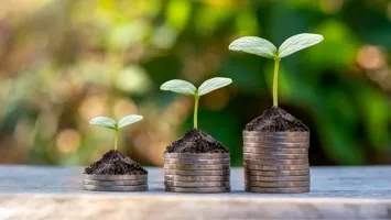 Generic image of money stacks to represent grants and commissioning