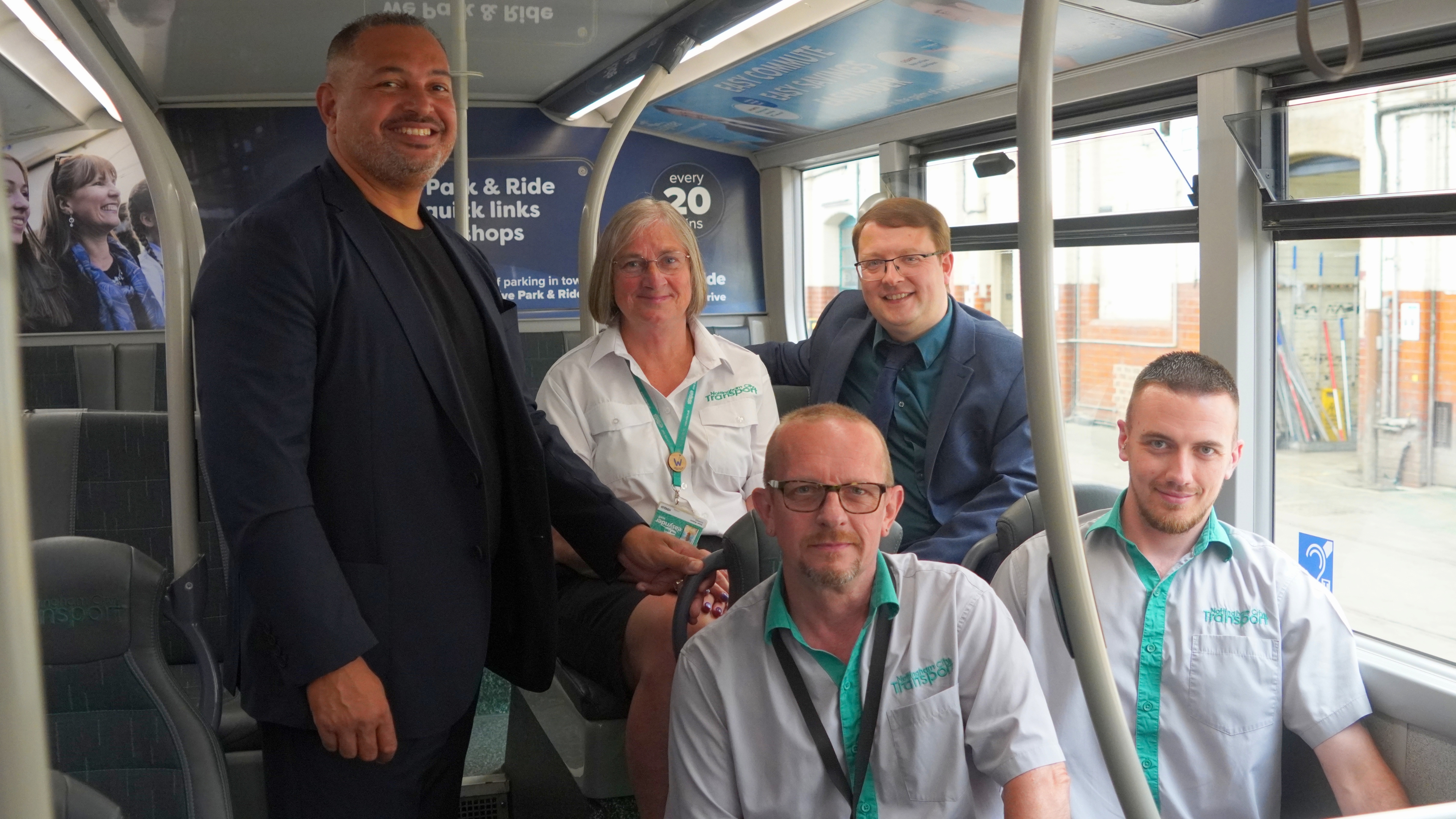 PCC Godden alongside drivers and staff from Nottingham City Transport PCC Godden alongside drivers and staff from Nottingham City Transport sitting on a bus