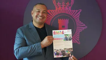 Police and Crime Commissioner Gary Godden holding his first Notts Voices newsletter