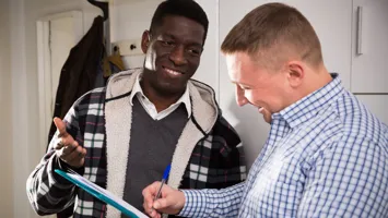 A man being surveyed