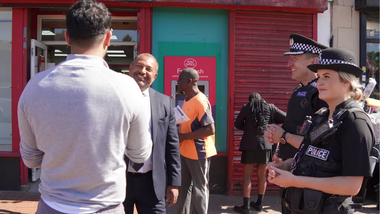 PCc Godden speaks to a member of the public
